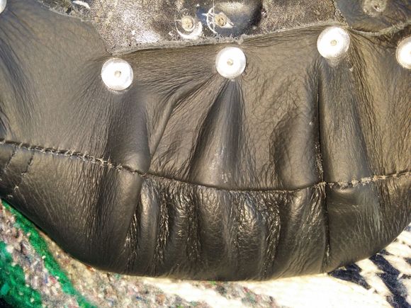 This is what the seat looks like 'now' after a Corbin recovering.  It looks like absolute shit.
