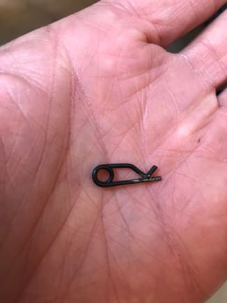 Mystery retaining pin