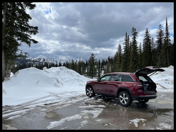… up on top of Kooteney Pass… As you can see, fresh snow up here… You can still get trapped in it this time of the year if you’re not careful… The road was bare & dry, but it supposed to rain this week… And I have chained up to get over this mountain pass in May and June… Caution still needs to be in-play for early in the year touring 