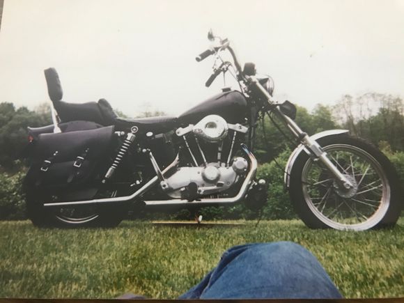 4" over forks by franks, rear shocks shotened 1.5".  needed to make a  chain guard to keep chain from eating bootom of oil tank when it bottomed out with the girlfriend (now wife) on the back. 3.5 gall fatbobs, wide glide fender redrilled to fit.  Mustang seat from a FX that I redid to fit and give me more lower back support.  Enfgine and Trans all rebuilt with all new wiring, kicck start only.  Loved that bike.