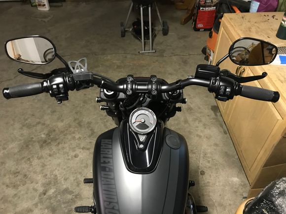 Installed RSD 4” Prostep bars, black anodized riser bolts, grips, black levers and LED turn signals. 
The bars are originally made for cable, but I thought they would look great on the bob so a 21mm reamer and a couple hours of work was necessary. No cables or wires needed (thankfully)! 