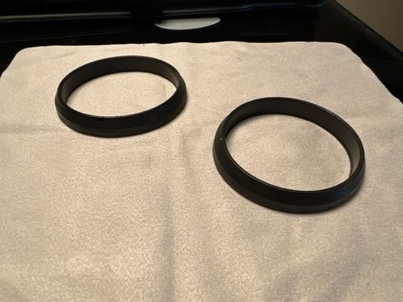 These were the old seals.  No nicks or breaks, but the were noticeably harder than the new ones.  I suspect it was just age that caused the leak