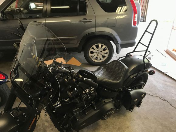 My Edward Richie sissy bar came in today. Looking forward to a Labor Day road trip. 
Sorry for the messy garage, woodworking project in progress. 