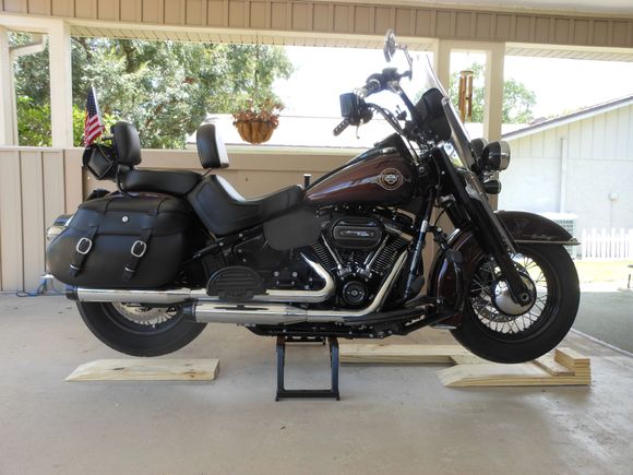 With one 2X8X8' plus some scrap I make this roll up to rais the bike 1 1/2"