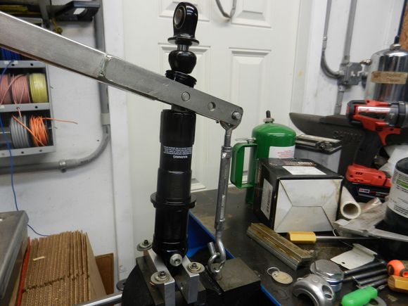 2. Remove the dust seal than remove the snap ring to get the seal head, shaft, piston, and end eye out.