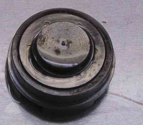The compression valve assembled. Note small hole in middle. 



-------------------------------------------