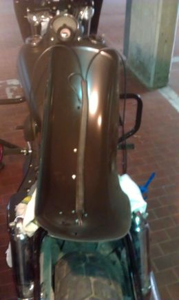 Harness is glued back on. You DO want to check if everything is connected the way it should BEFORE re assembling. I.e. I mixed the brake connection width my left tail light...