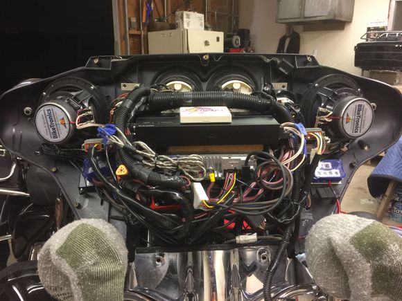 My amp is really big, but I velcroed a piece of 1x4 to my head unit then velcroed my amp on top of that. You'll need some 6.5 speaker adapter rings as well.