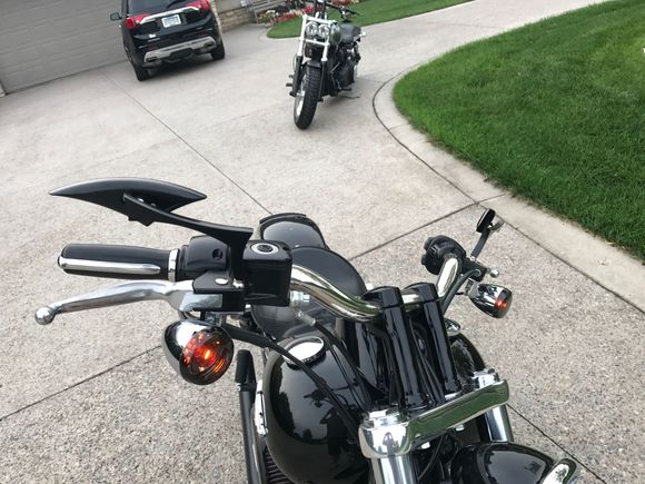 Low profile mirrors, heated grips and smoked turn signals in this image