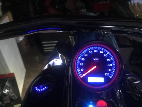 SO I SENT MY SOEEDOMETER OUT, HE CUSTOM MICRO SOLDERS ON BOARD, BLUE WHERE THE DISPLAY IS LOWER, RED NUMBERS, PICS DONT SHOW LED WELL THO, ITS REAL NICE, WITH BLUE GAS GAUGE