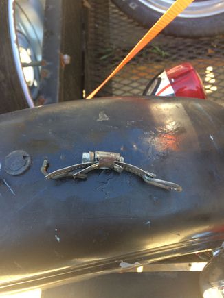 Homemade strap holding the tank