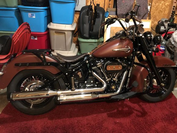 Just finished the spring solo project. 1st, the Harley seat does work, but not without some minor mods. Also, the taillight harness and a few holes in the fender need covering up. I put on a piece of leather for now, but will be making a longer one that matches the tank panel. So far I dig it, but time and miles will tell.
