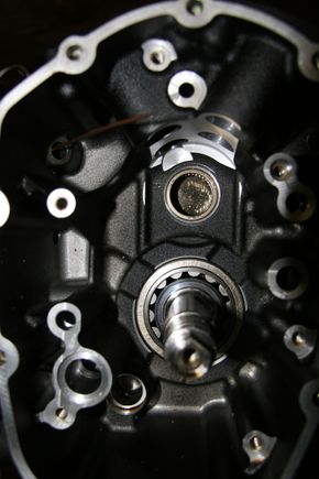 Look in the upper left area and you will see the hole with the wire sticking out of it that goes to the engine crankcase.