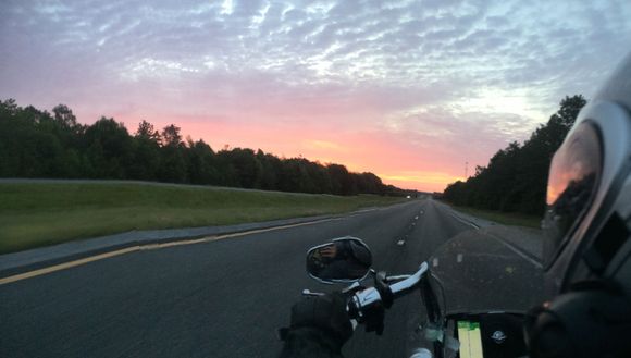 Riding across Florida as the sun came up on the final day of our coast to coast ride.