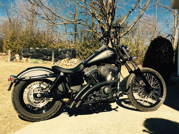 here was my winter project. Hd chizeled bars, retro grips, slotted primary and timing cover, signal relocation with drag specialtys brackets, 21 inch front 2.25 rim, burley slammers, day maker, and bassini sweepers,