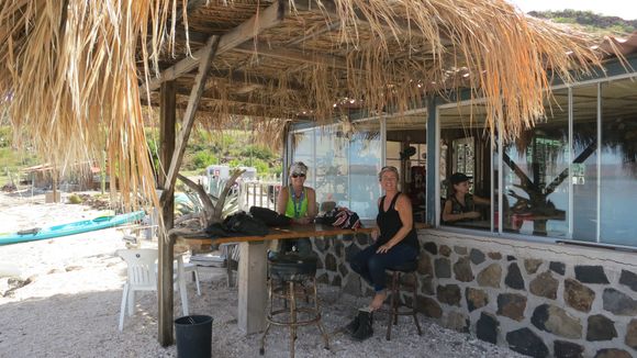 Maryellen and Kim relax in the shade