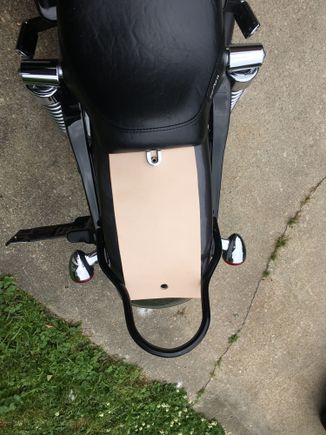 Blank 9oz cowhide panel with mount holes cut, ready for some leatherworking