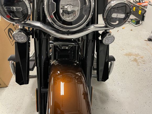 Left side (when sitting on the bike) close the fairing, the other side mounted away. 