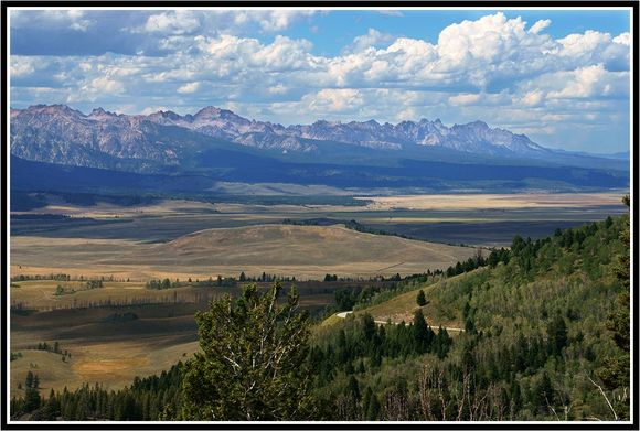 From the top of Galena Summit… 8,700 feet… With the Sawtooth Mountains in the background… Stanley, Idaho would be up at the far right end of the mountains… One of the most beautiful views I have ever seen…