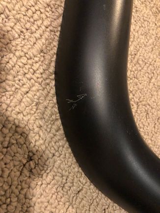 Minor scratches only on the front heat shield