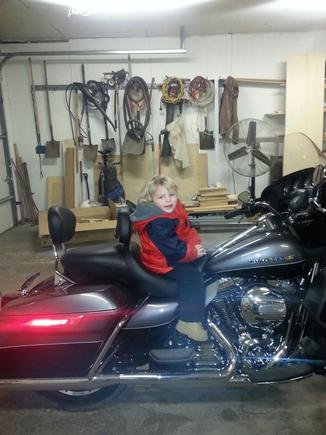 Stock seat with detach backrest.



And a grandson!!lol