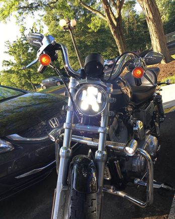 High beams. The bike came with the goofy extra lights on the engine guard, and I see no need to remove them, as any extra lights can help.