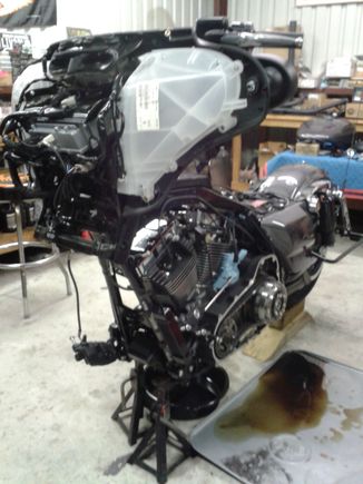 as the manual says !!!    first ...strip motorcycle for maintenance...
