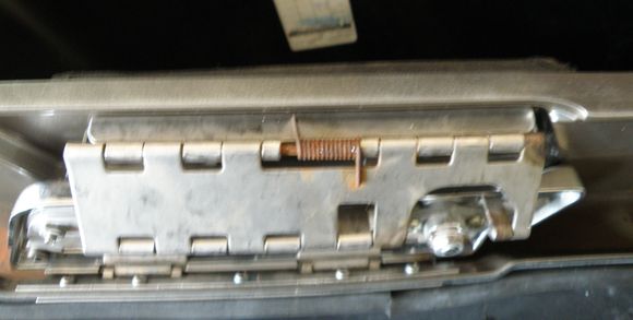 strap removed and latch spread open