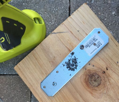 Drilling hole for DIY Compressor tool. Screwed it down to a board to hold it still and sprayed WD40 to give some slip/reduce heat on drill bit