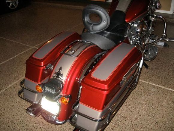 Re-worked back end - dropped, re-positioned license plate, new bright ass light breaklight, Steet glide shocks and turn signals as well.