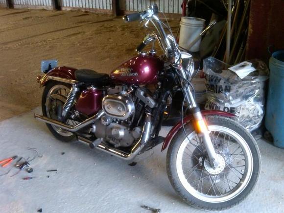 Getting rid of extra parts. Saddlebags-gone, saddle seat-gone, windshield- gone. Now we're getting somewhere!