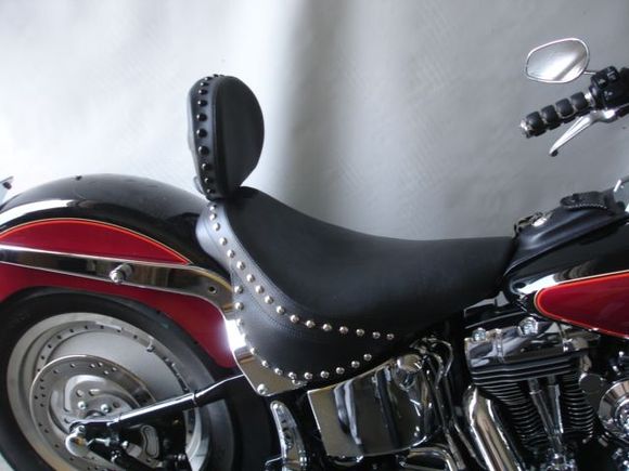 Seat with Side Skirts
http://www.sideroadcycles.com/AmericanMotorcycles/Seats/Motorcycle_Seats.html