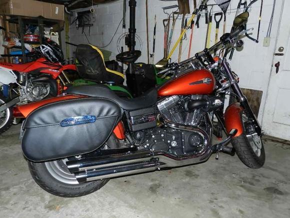 Done for now: Rush 2" Slip Ons, Heavy Breather Air Intake, TK3 Fuel Injection Modulator, Diamond Cut Series Controls, Hard Locking Bags, Gremlin Bell (Thanks Rob!)  Not in photo Medallion Backrest detach frame with large cushion, Sundowner seat, accessory plug, Skully (my skeleton rider).
