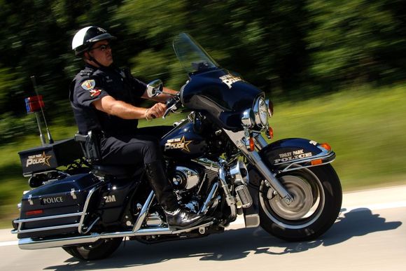 A Motor Officer Friend I photographed.  The Tinley Park Police Department uses this photo on their official website.
