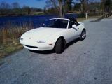 This is my 93 Miata. It has been my office for more than a year and a half, (since I started the job). I'm retiring it, (it's for sale), as it's much too good a car to run into the ground. 32 miles a gallon is nice.