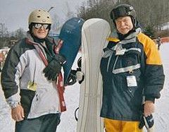 too old to ski..been snowboarding for 20 years (age 63) with my brother, left (age 61).
its fun when you hear the kids say,
"did you see how old those dudes were?"