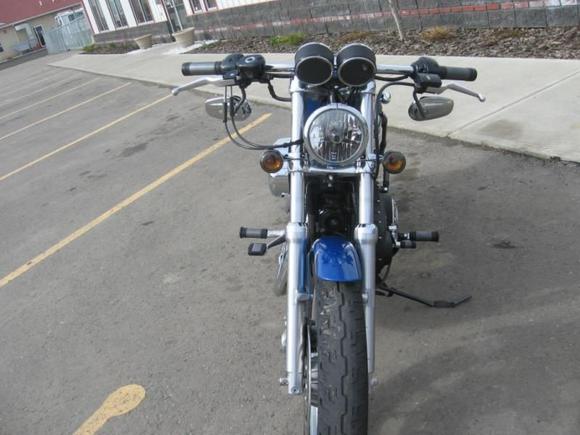 relocated headlight, no eyebrow/visor.