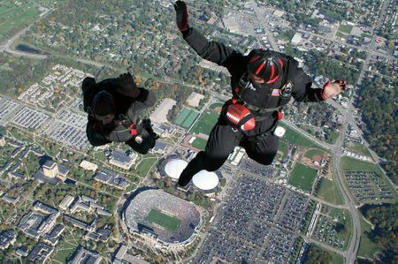 Black Dagger jumping in the Game ball into the Notre Dame stadium