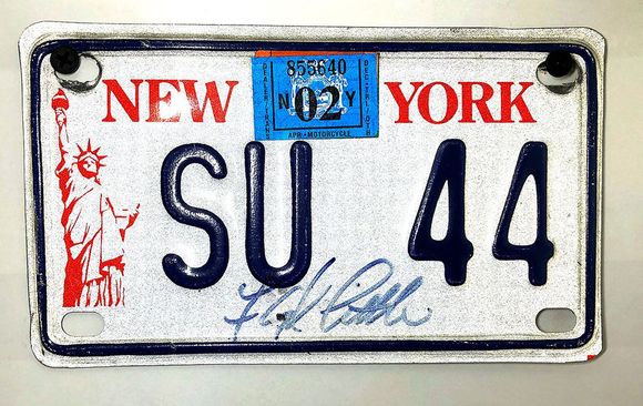 Older style off ff my metric cruiser. This plate is signed by Pro & College Football Hall of Famer Floyd Little. He work 44 at Syracuse.