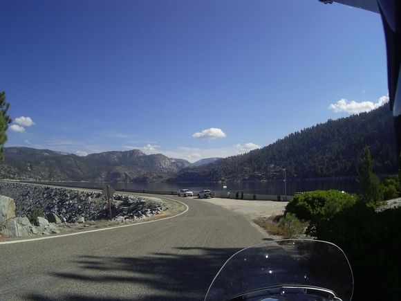 There a narrow road across the top of the dam. People fish from it.