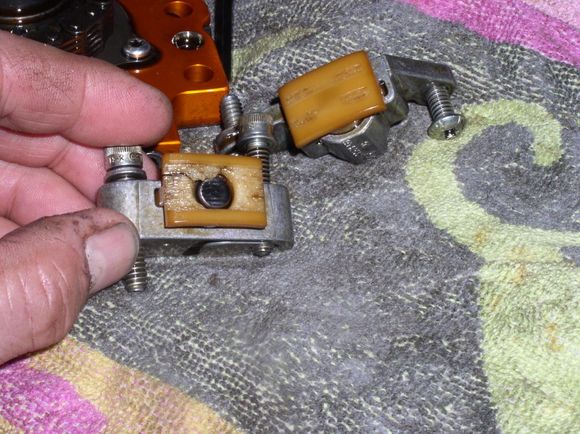 HDFORUM USER on here with aftermarket hydraulic tensioner and didn't replace cams to get roller chain on back tensioner.
Think he had less than 15K on them.