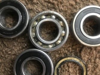 THE CULPRITS, HOW DO YOU INSTALL CHINA MADE SINGLE ROW BEARING IN WHEELS, TIMKENS GOING IN MINE, BUT IVE SEEN THEM AS CHEAP AS 25 A PAIR FOR DOUBLE ROW, THATS WHAT YOU WANT, UNLESS YOU LIKE YOUR WHEEL TO LOCK UP WHEN THAT BEARING FREEZES UP ON YOU,,, TIMKENS ARE 35 A POP, BUT WORTH IT TO ME....