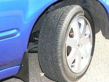 Original factory installed wheel and Michelin XGT V4.  (Front right side)  The back wheels and tires look just as good.