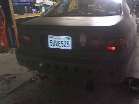 Rear view idk why the preivous owner did this to the rear bumper but im also doing a brake job on the drums