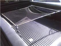 Bed net dowsn't completely cover the whole bed because I had to fold some of it up at the front to make the cargo net space part...but it covers probably 60% of the bed which is more than enough for me.