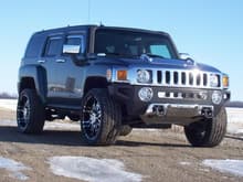 Hood vent cover, side marker guards, fog light bezels, billet lower grille, chrome apron cover, HUMMER Bumper inserts. Came with factory chrome door handles and mirror covers.