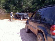 sunk in Upatoi creek, Ft. Benning Ga.  Took this Liberty and a Wrangler both with snatch blocks, and a compined pulling power of around 36,000 lbs to get Big Sarge unstuck, only 5 feet from the bank and in 10 inches of water.  lol