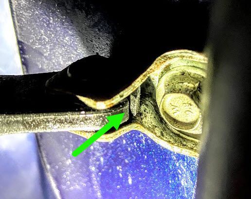 broken door check at hinge