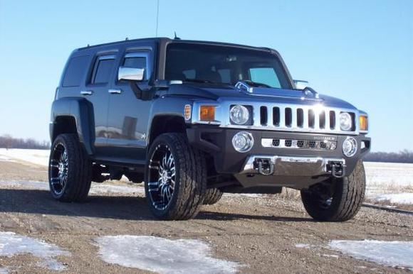 Hood vent cover, side marker guards, fog light bezels, billet lower grille, chrome apron cover, HUMMER Bumper inserts. Came with factory chrome door handles and mirror covers.