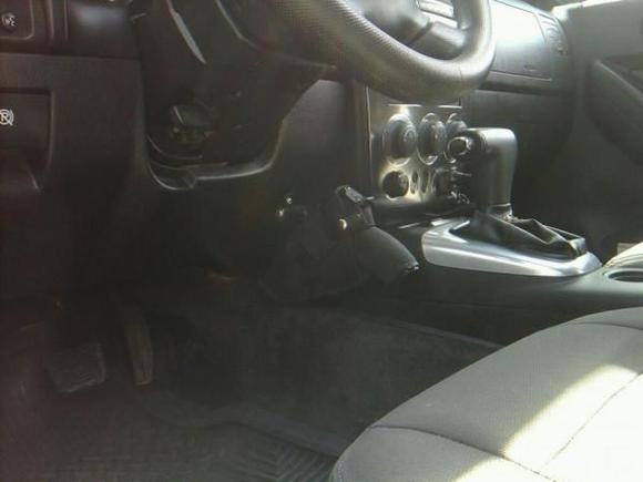 Grassburr vehicle mounted holster installed.